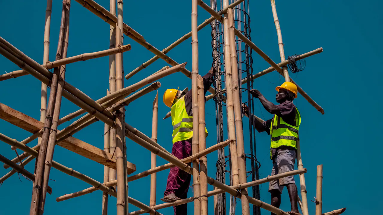 A construction worker in a branded uniform