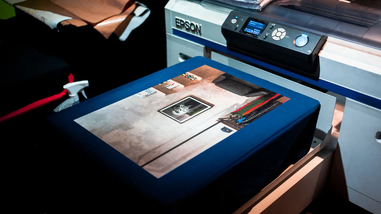 A direct-to-garment printer printing a t-shirt