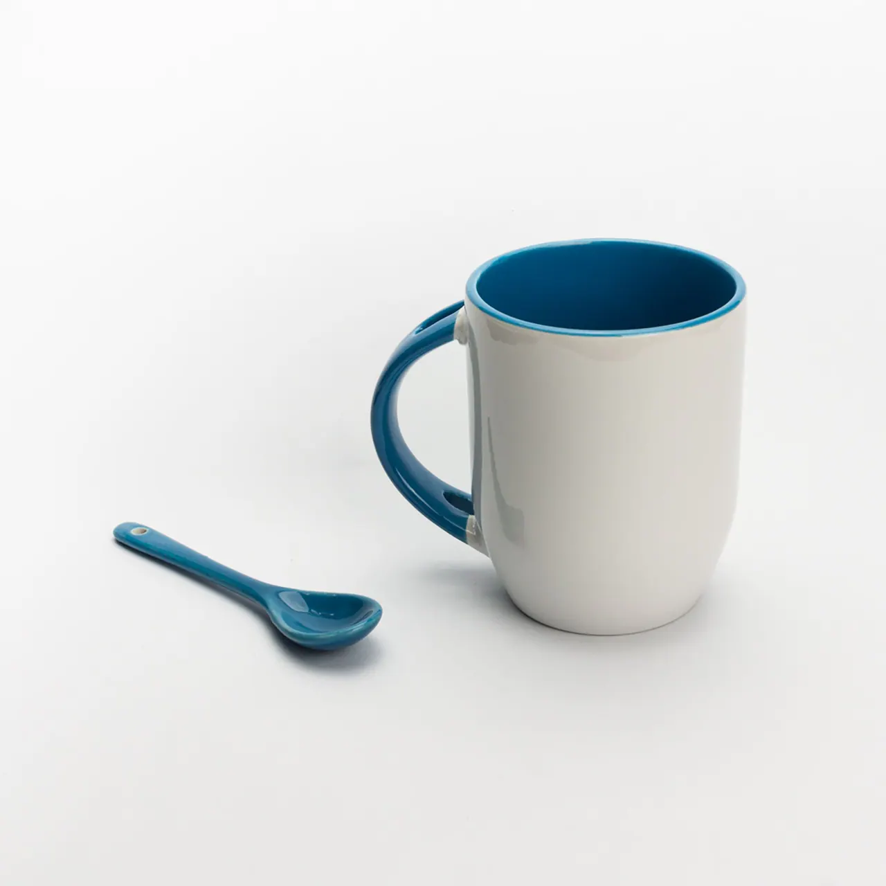 A plain white ceramic mug